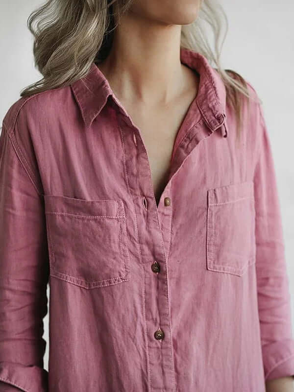Elegant women's relaxed fit linen jumpsuit. Straight leg, long sleeves, button-down. Comfortable and versatile summer wear.