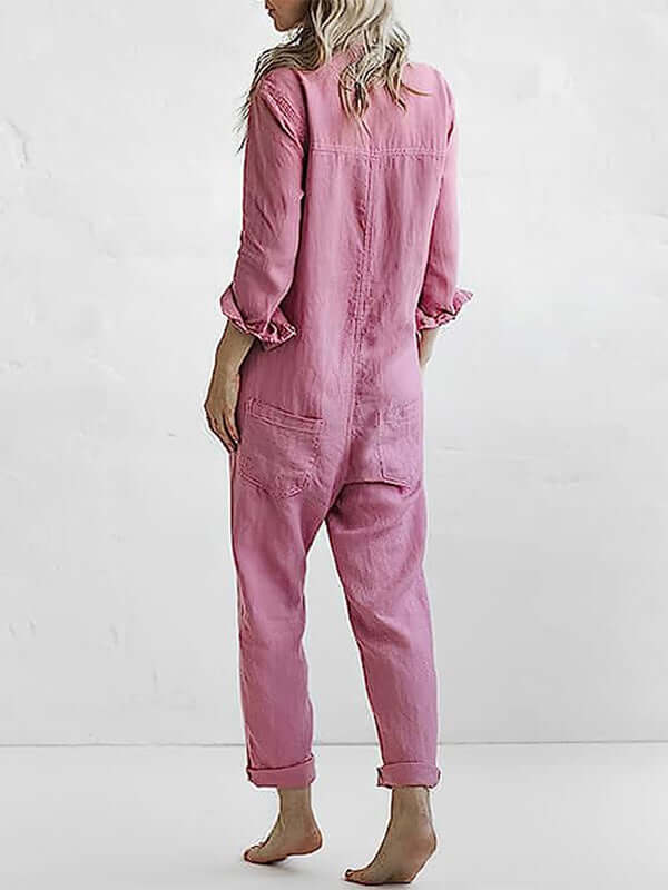 Relaxed fit women's linen jumpsuit with straight leg and long sleeves. A comfortable, breathable button-down casual outfit.