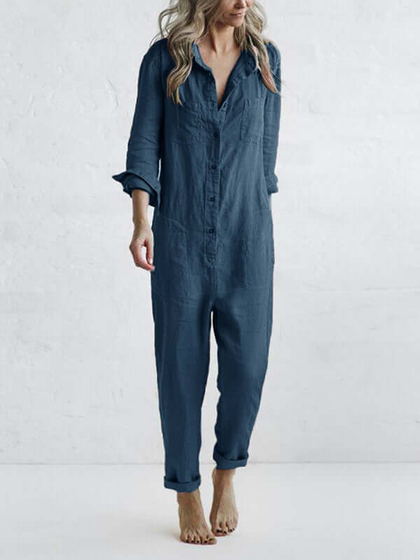 Button-down women's linen jumpsuit, relaxed fit with straight leg and long sleeves. Breathable and comfortable summer outfit.