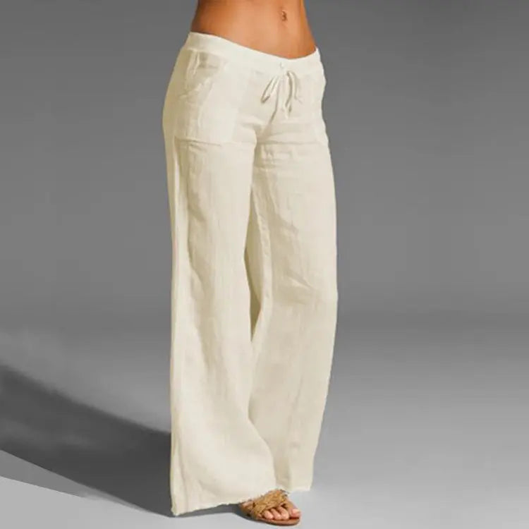 Women's relaxed fit linen trousers with elastic waistband. Perfect for summer, travel, and casual comfort.