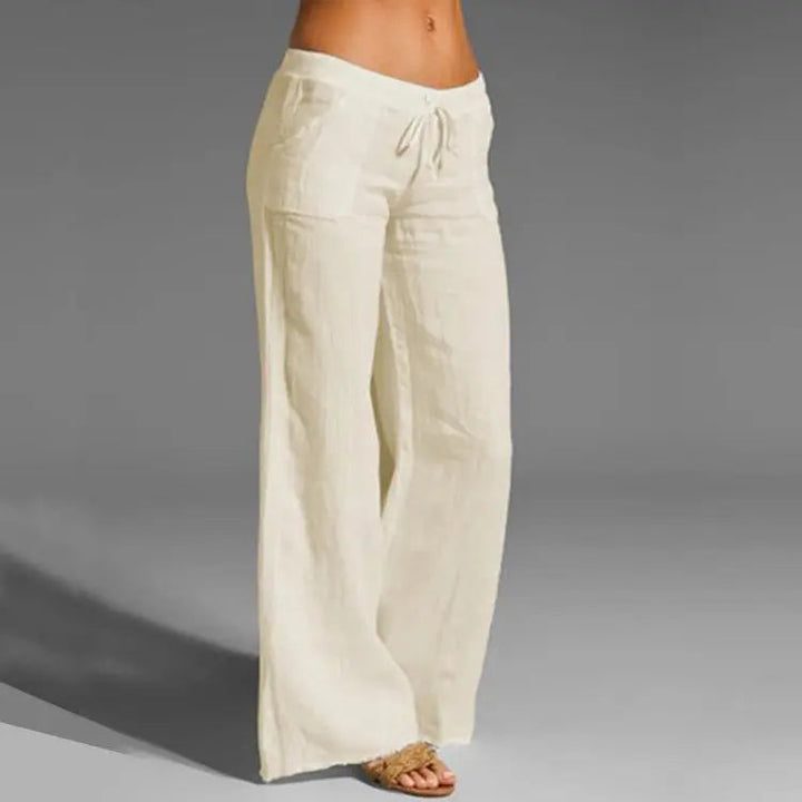 Women's relaxed fit linen trousers with elastic waistband. Perfect for summer, travel, and casual comfort.