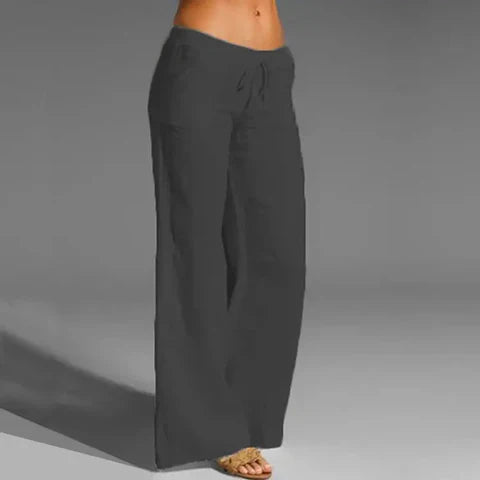 Breathable women's linen pants with an elastic waist, ideal for comfortable summer wear & vacation outfits.