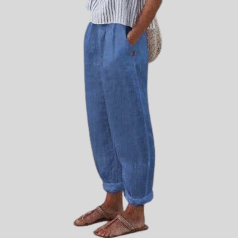 Breathable linen trousers for women, designed with a relaxed fit and folded hem, ideal for spring & summer comfort.