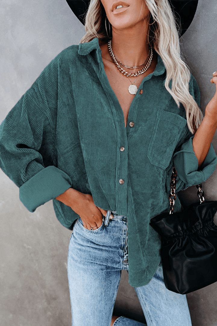 Women's relaxed long sleeve shirt, drop shoulder design, excellent for comfort & style.