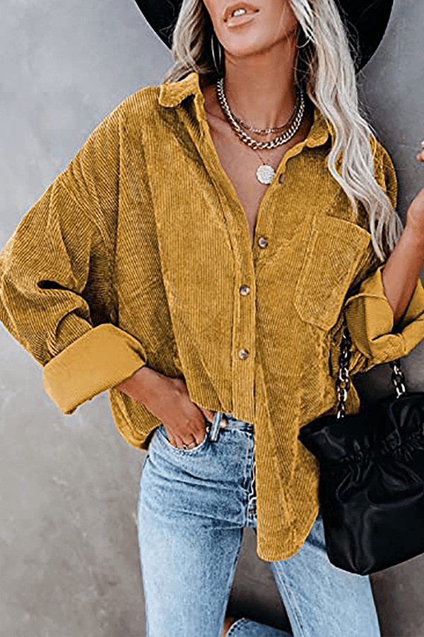 Stylish women's long sleeve top with relaxed drop shoulders, ideal for versatile styling.