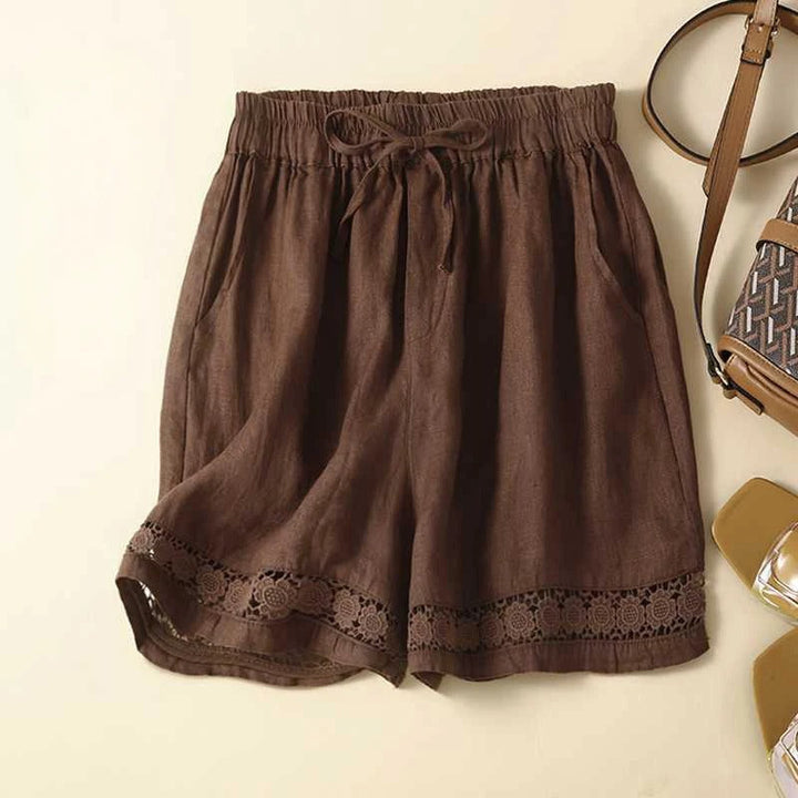 Stylish women's relaxed fit embroidered shorts, versatile for comfortable everyday & chic warm weather fashion.