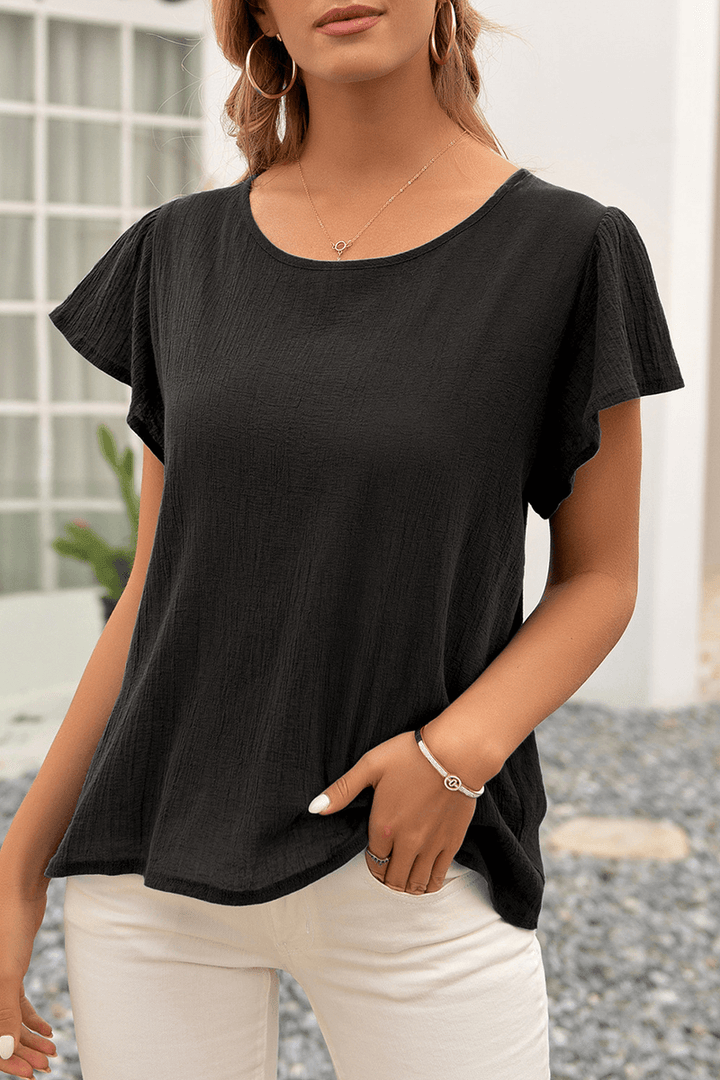 Women's relaxed fit textured crinkle top with short sleeves & round neck, perfect for casual summer fashion.