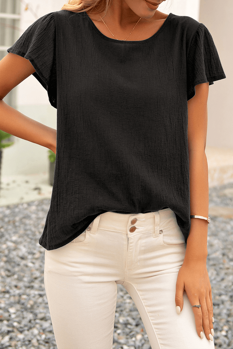 Versatile women's short sleeve crinkle top with a textured finish & relaxed fit, ideal for casual everyday style.