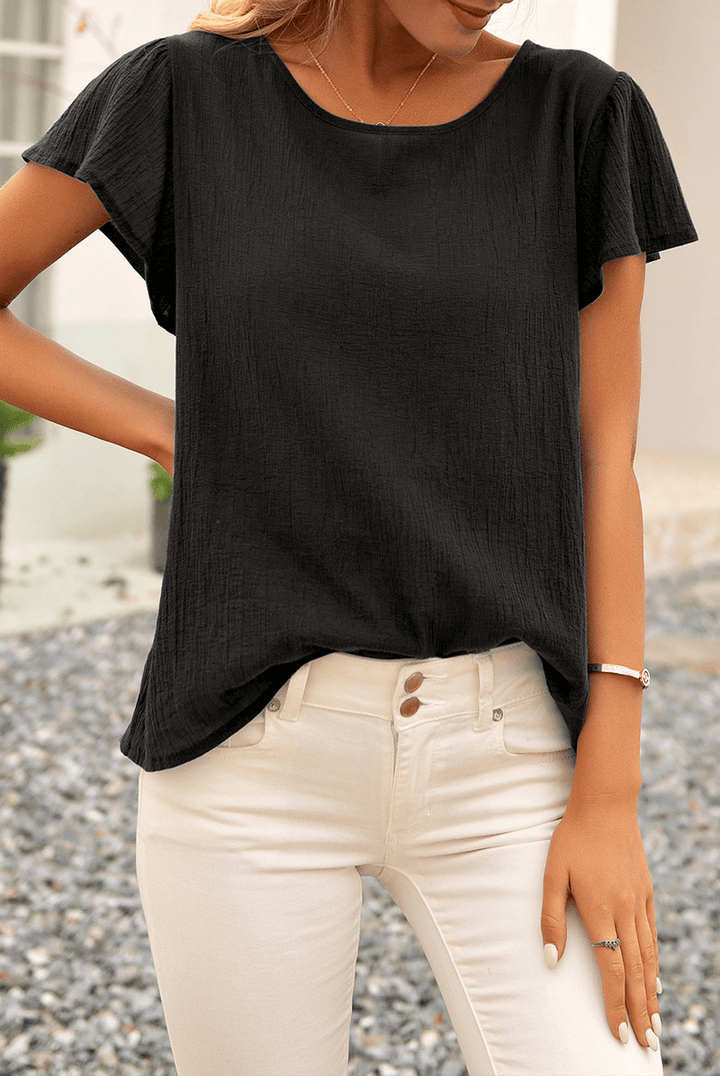 Versatile women's short sleeve crinkle top with a textured finish & relaxed fit, ideal for casual everyday style.