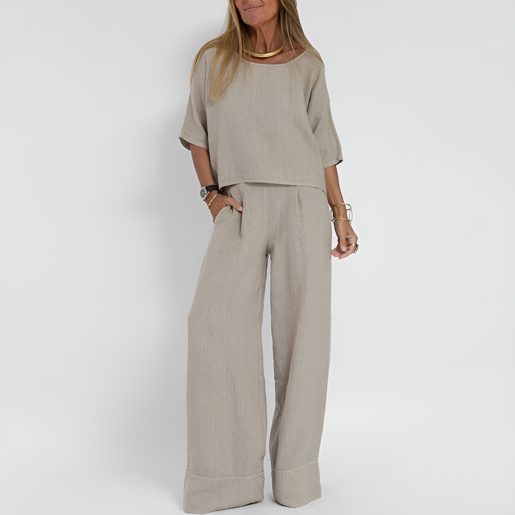 Women's relaxed fit two-piece summer outfit with wide-leg pants. Comfortable matching set for casual wear.