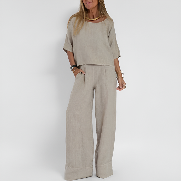 Women's relaxed fit two-piece summer outfit with wide-leg pants. Comfortable matching set for casual wear.