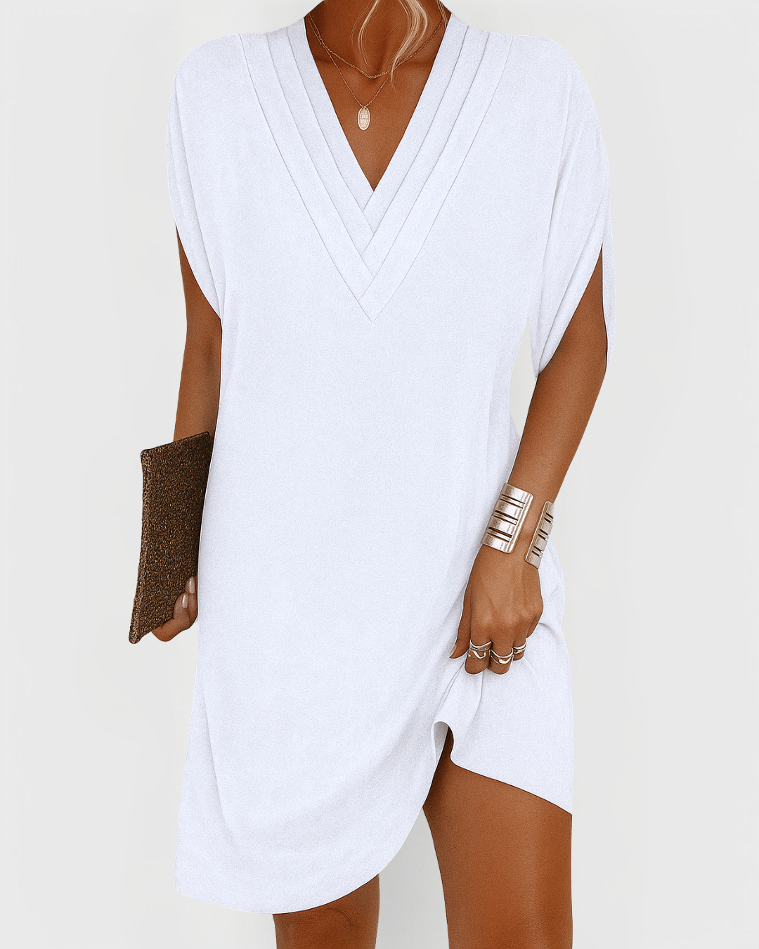 Comfortable women's relaxed V-neck dress, an easy short style perfect as beachwear or a casual summer dress.