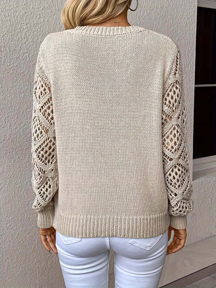 Elegant relaxed fit knit top for women, ideal for casual wear.