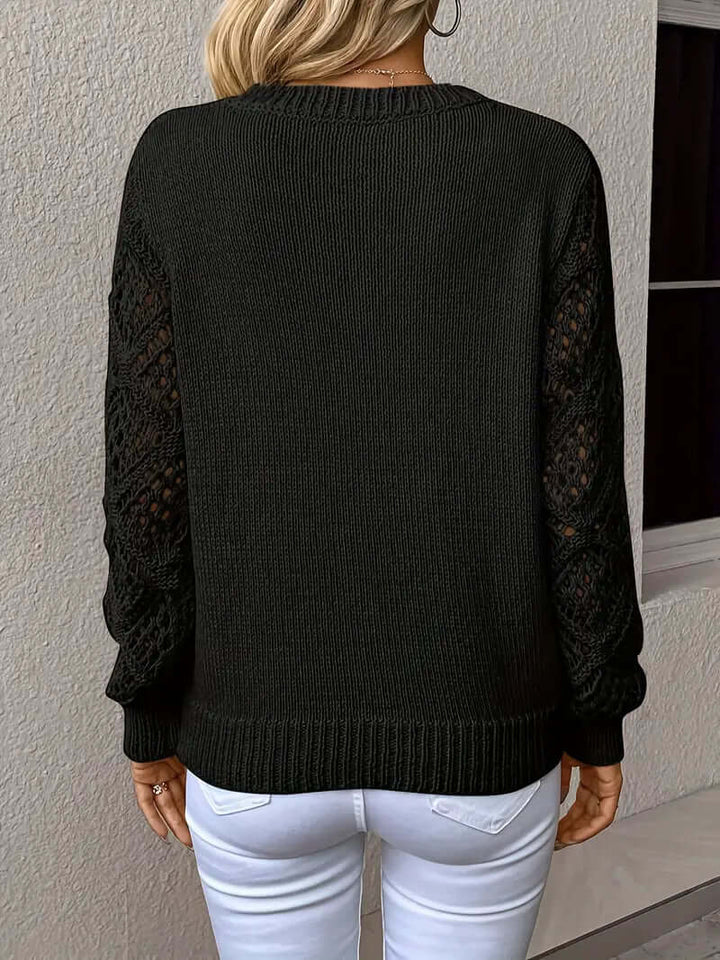 Soft acrylic open knit V-neck sweater, long sleeve, great for casual outfits.