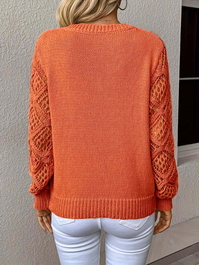 Long sleeve acrylic knit V-neck sweater, a relaxed and elegant layering piece for women.