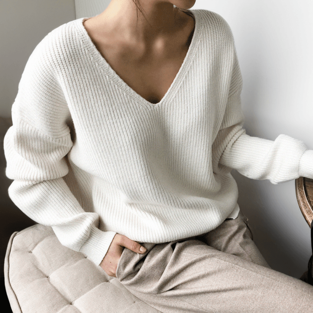 Versatile women's long sleeve V-neck sweater, relaxed knit for cozy style.