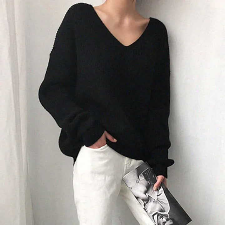 Cozy & stylish women's relaxed fit V-neck sweater, perfect for everyday wear.