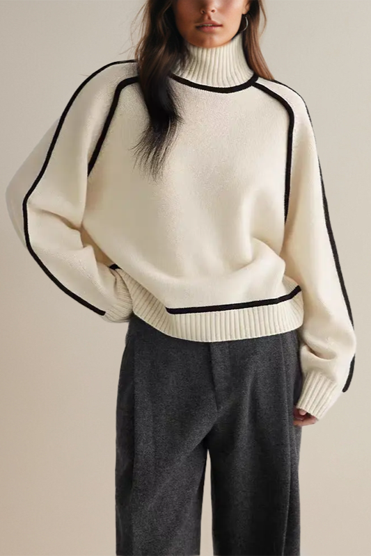 Soft knit women's turtleneck sweater with a relaxed fit, ideal for cozy casual layering.