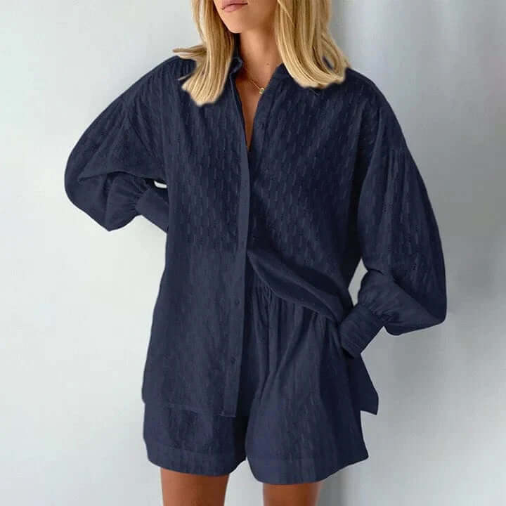 Comfortable women's two-piece set with a relaxed fit shirt and shorts for warm weather.