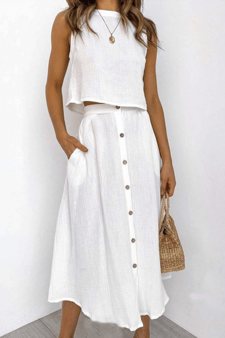 Women's relaxed round neck top and midi skirt set, perfect for comfortable and chic daily wear.