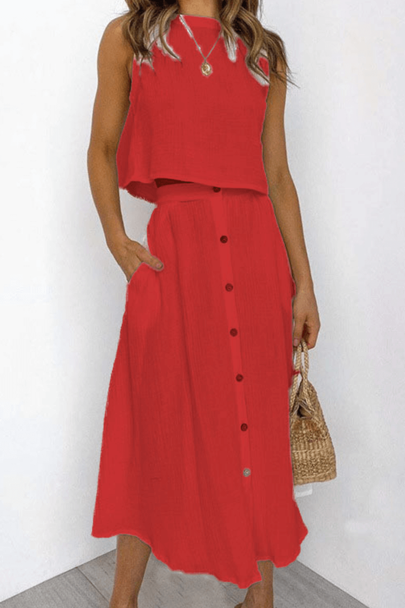 Comfortable women's daily wear two-piece set, featuring a relaxed round neck top and a stylish midi skirt.