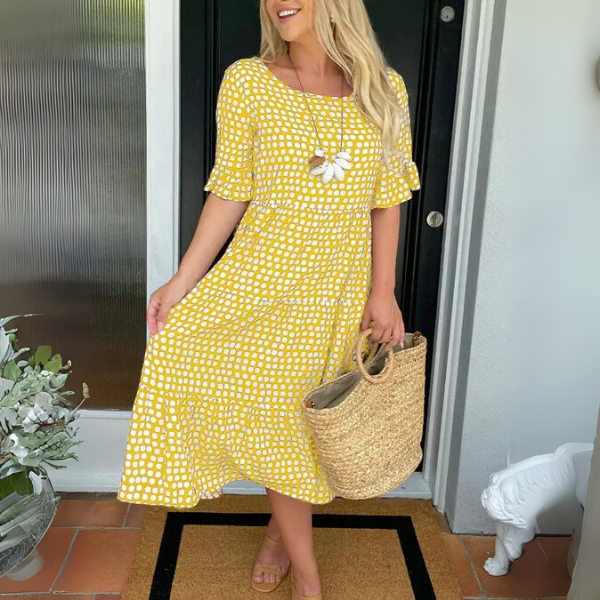 Elegant women's tiered midi dress with a relaxed fit for versatile summer fashion and effortless style.