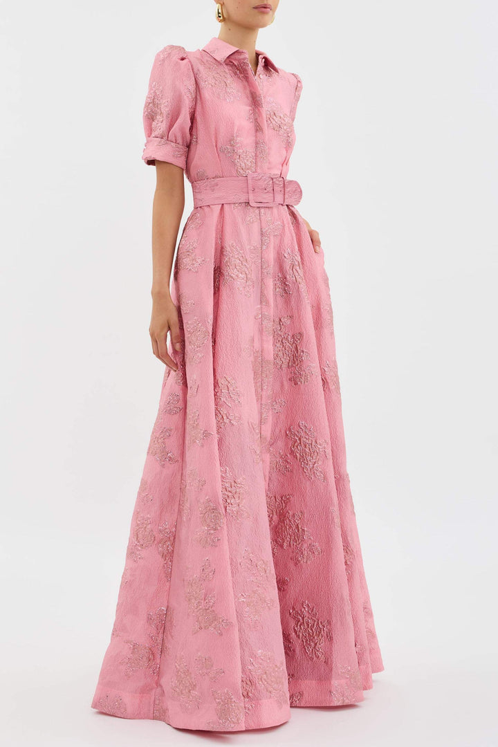 Classic women's vintage pink dress featuring a chic lapel and flattering high waist for a feminine look.