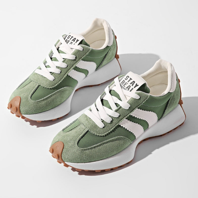 Women's retro platform sneakers with chunky sole and stylish lace-up design for comfortable everyday wear.