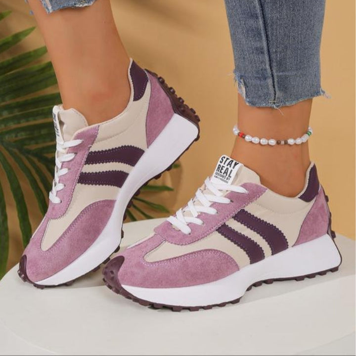 Elegant women's vintage platform trainers, offering a comfortable fit and a fashionable aesthetic for any casual occasion.