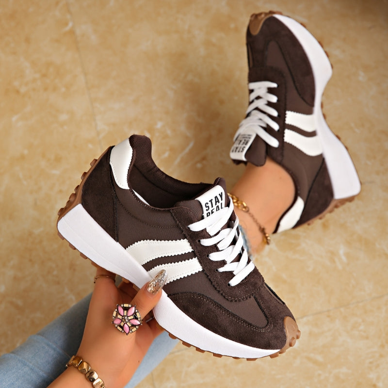 Back view of comfortable women's retro sneakers, highlighting the chunky platform sole and durable design.