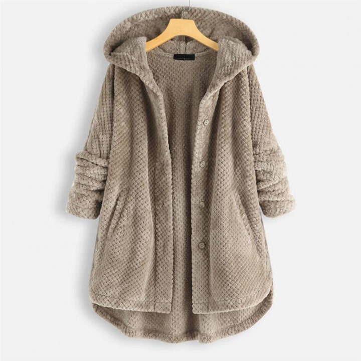 Practical women's reversible hooded jacket. Stylish FleeceLux outerwear for versatile fall & winter comfort.