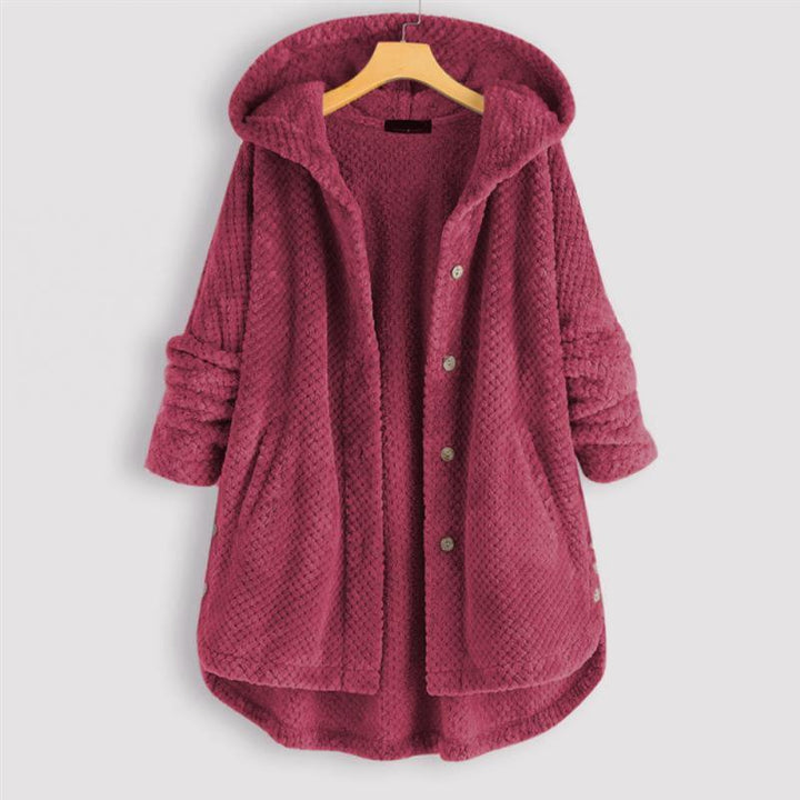 Modern women's reversible hooded jacket. Cozy FleeceLux outerwear for stylish fall comfort & winter warmth.