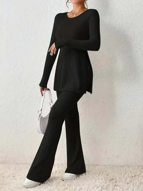 Comfortable women's ribbed knit lounge wear set with long sleeve top and flared trousers.