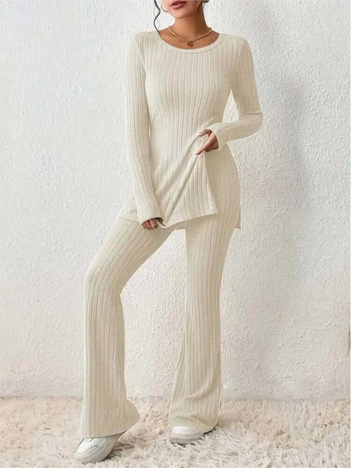 Fall fashion women's ribbed knit two-piece set, featuring a long sleeve top and comfortable flared trousers.