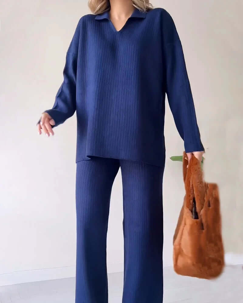 V-neck ribbed knit loungewear sweater for women, paired with matching flared pants, cozy & chic.