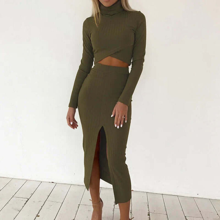 Woman posing in a versatile ribbed knit two-piece matching set, featuring a crop top & midi skirt.