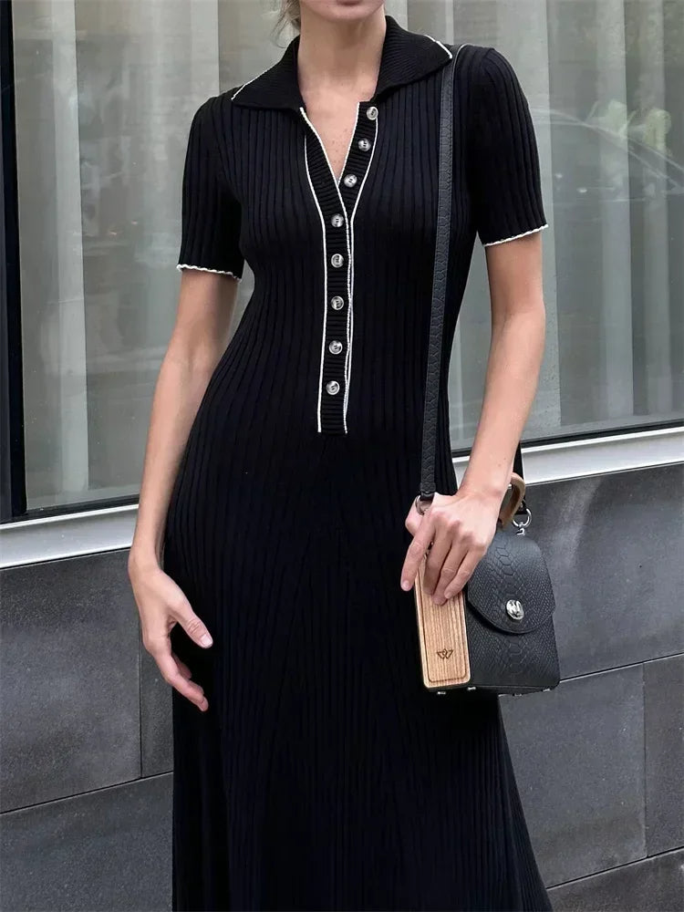 Women's ribbed knit long dress with a flattering V-neck and stylish front button detailing.