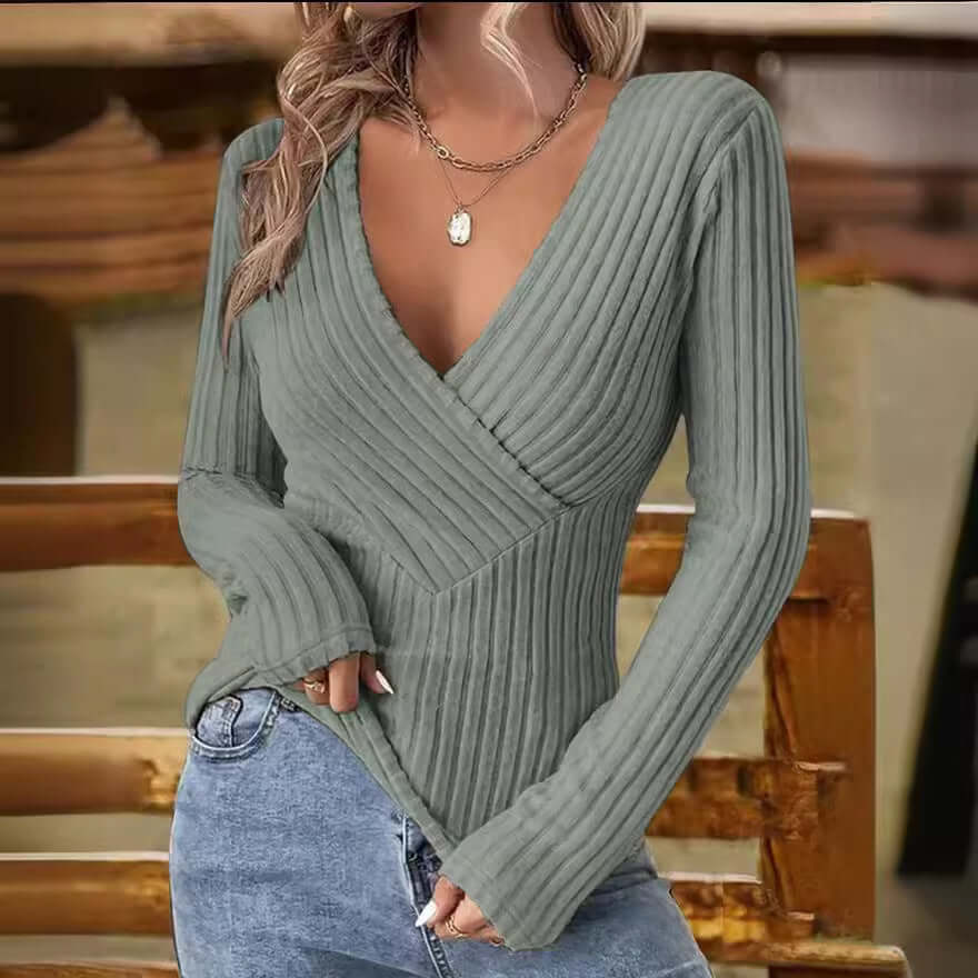 Comfortable women's long sleeve ribbed sweater featuring a fashionable wrap V-neck design.