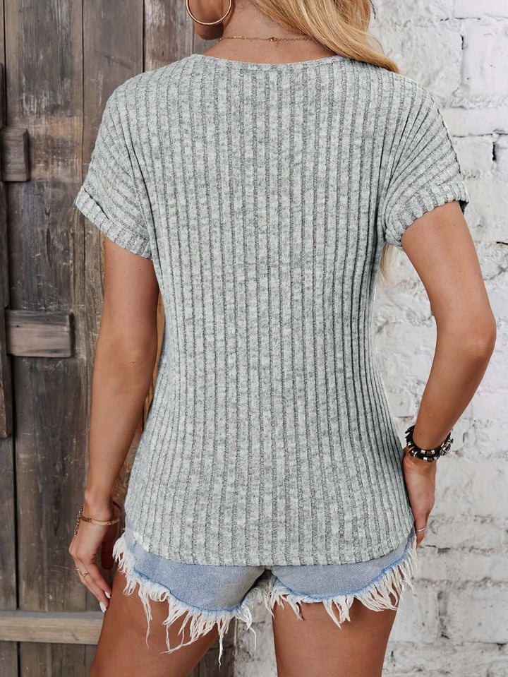 Button-up women's long sleeve ribbed knitted henley top, stylish & comfortable casual shirt.