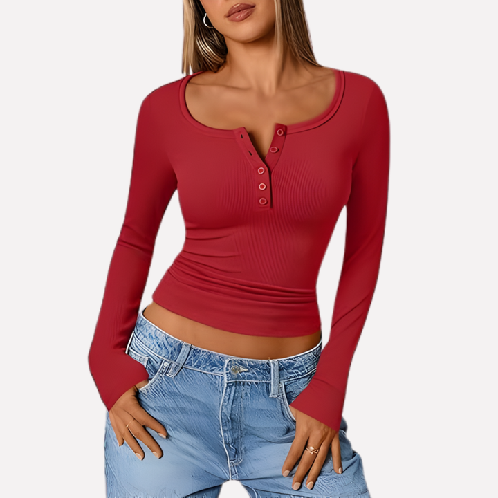 Classic women's ribbed long sleeve Henley top with button detail, great for multiple occasions.