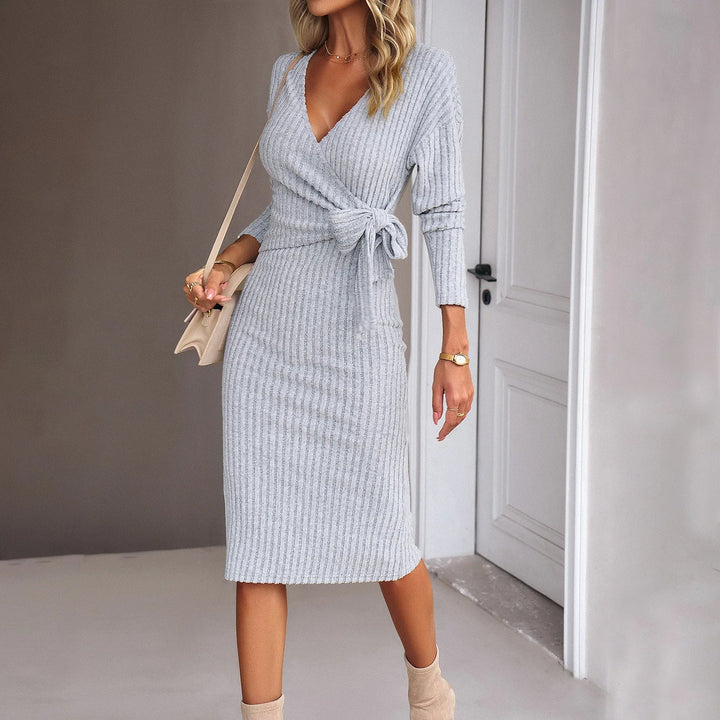 Elegant women's v-neck ribbed midi knit wrap dress with long sleeves, ideal for sophisticated party wear.