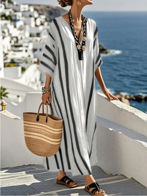 Flowing kaftan style Women's long dress, comfortable for beach days or summer vacation wear. Boho ethnic print.