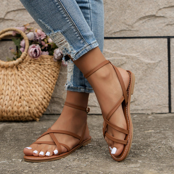 Comfortable women's Roman-style sandals with multiple straps and a functional back zipper, great for summer.