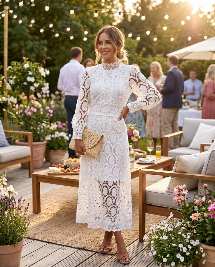 Women's romantic flowy maxi dress, perfect for summer parties & elegant evening wear. High neck, long sleeve.