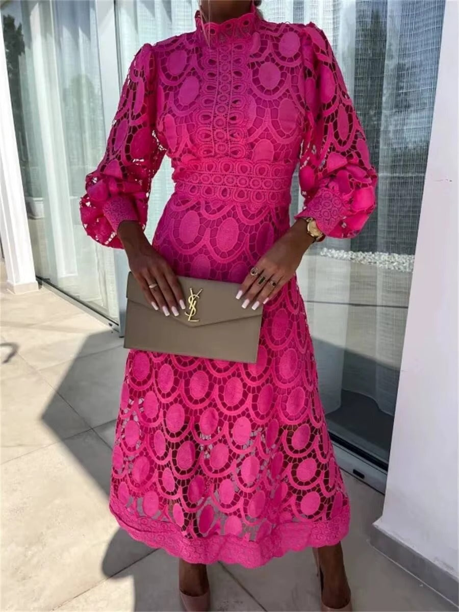 Graceful women's long-sleeve, high-neck maxi dress. Flowy and elegant, suitable for summer events.