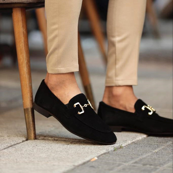 Stylish women's slip-on loafers with round toe design, ideal comfortable footwear for any occasion.