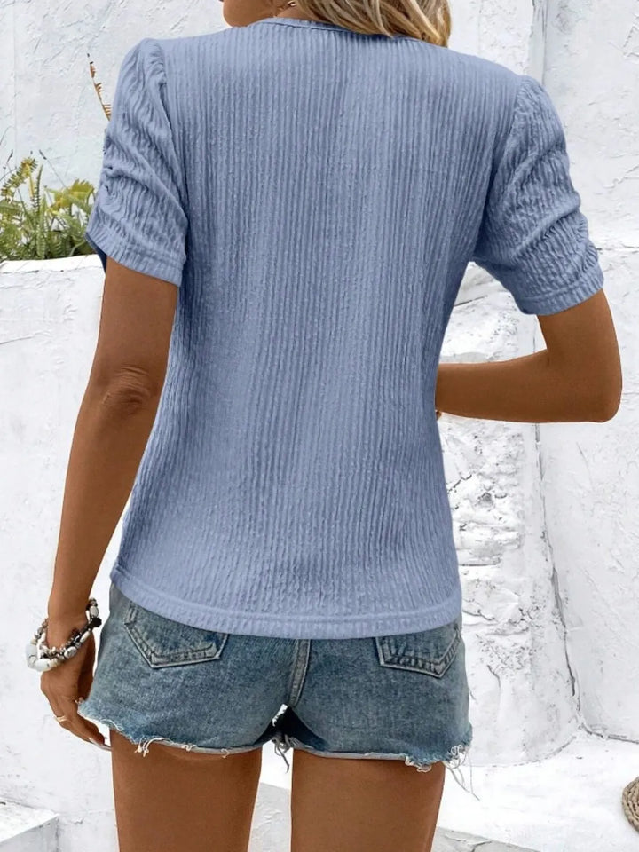 Summer-ready women's ruched short sleeve top, a chic fitted knit blouse.