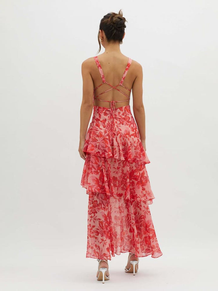 Elegant women's summer midi dress featuring a vibrant floral print, playful ruffles, and a flattering V-neck.