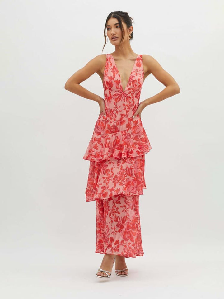 Effortless women's flowy tiered floral midi dress with ruffles, ideal for summer fashion and comfort.