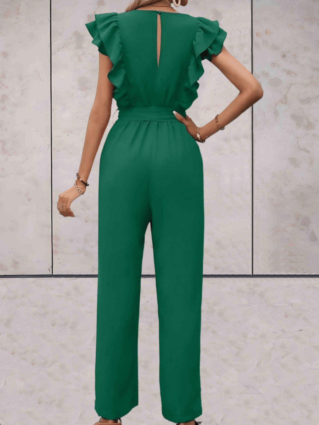 Fashionable V-neck women's jumpsuit featuring trendy ruffled short sleeves, a modern chic look.